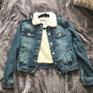 Denim jacket with fur collar trimming